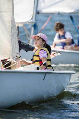 Focused young girl learning to sail a dinghy Providence, Rhode Island, United States CR_CABR260812-2105395-01 ,model released, Symbolfoto ,property released