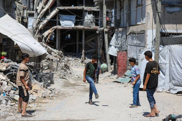 Palestinians live amid destruction in Jabalia camp JABALIA REFUGEE CAMP, NORTHERN GAZA STRIP, PALESTINE, AUGUST 23, 2026: Palestinians live amid the rubble of destroyed homes and extensive damage in Jabalia refugee camp in the northern Gaza Strip, facing difficult living conditions as they seek safety and basic necessities. JABALIA Palestine, State of Copyright: x xRamzixAbuxAmerx xJNAxPressx
