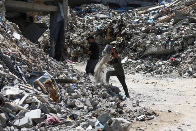 Palestinians live amid destruction in Jabalia camp JABALIA REFUGEE CAMP, NORTHERN GAZA STRIP, PALESTINE, AUGUST 23, 2026: Palestinians live amid the rubble of destroyed homes and extensive damage in Jabalia refugee camp in the northern Gaza Strip, facing difficult living conditions as they seek safety and basic necessities. JABALIA Palestine, State of Copyright: x xRamzixAbuxAmerx xJNAxPressx