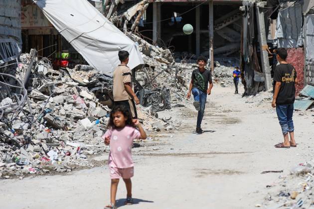 Palestinians live amid destruction in Jabalia camp JABALIA REFUGEE CAMP, NORTHERN GAZA STRIP, PALESTINE, AUGUST 23, 2026: Palestinians live amid the rubble of destroyed homes and extensive damage in Jabalia refugee camp in the northern Gaza Strip, facing difficult living conditions as they seek safety and basic necessities. JABALIA Palestine, State of Copyright: x xRamzixAbuxAmerx xJNAxPressx