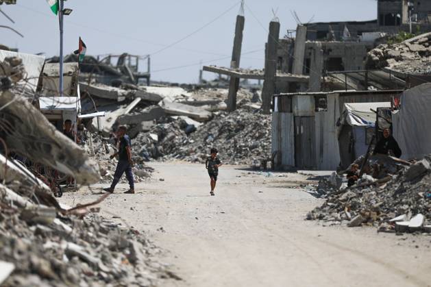 Palestinians live amid destruction in Jabalia camp JABALIA REFUGEE CAMP, NORTHERN GAZA STRIP, PALESTINE, AUGUST 23, 2026: Palestinians live amid the rubble of destroyed homes and extensive damage in Jabalia refugee camp in the northern Gaza Strip, facing difficult living conditions as they seek safety and basic necessities. JABALIA Palestine, State of Copyright: x xRamzixAbuxAmerx xJNAxPressx