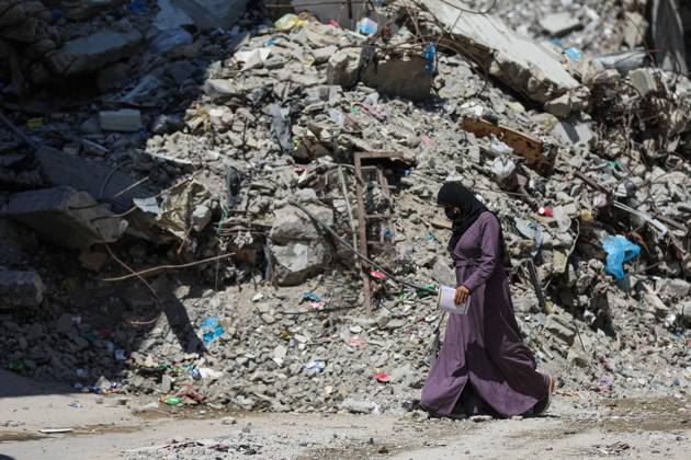 Palestinians live amid destruction in Jabalia camp JABALIA REFUGEE CAMP, NORTHERN GAZA STRIP, PALESTINE, AUGUST 23, 2026: Palestinians live amid the rubble of destroyed homes and extensive damage in Jabalia refugee camp in the northern Gaza Strip, facing difficult living conditions as they seek safety and basic necessities. JABALIA Palestine, State of Copyright: x xRamzixAbuxAmerx xJNAxPressx