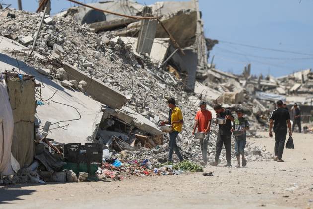 Palestinians live amid destruction in Jabalia camp JABALIA REFUGEE CAMP, NORTHERN GAZA STRIP, PALESTINE, AUGUST 23, 2026: Palestinians live amid the rubble of destroyed homes and extensive damage in Jabalia refugee camp in the northern Gaza Strip, facing difficult living conditions as they seek safety and basic necessities. JABALIA Palestine, State of Copyright: x xRamzixAbuxAmerx xJNAxPressx