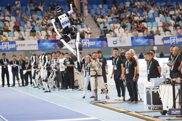 BEIJING, CHINA - AUGUST 23: A humanoid robot competes during the Long Jump event on day 2 of the 2nd World Humanoid Robot Games at National Speed Skating Oval on August 23, 2026 in Beijing, China.  Copyright: xChinaxNewsxServicex 111661706303