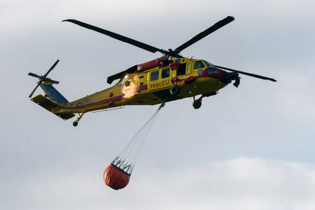 August 24, 2026, Kajtasovo, Vojvodina, Serbia: 2026823, Kajtasovo, Serbia -The European Union is actively assisting Serbia in battling severe wildfires at Serbia s request through the EU Civil Protection Mechanism, deploying four firefighting helicopters from Romania, Slovakia, the Czech Republic, and Germany, alongside ground response teams to contain large blazes like the one in the Deliblato Sands. A Romanian rescEU Black Hawk helicopter. Kajtasovo Serbia - ZUMAd223 20260824_zip_d223_002 Copyright: xMarkoxDimicx