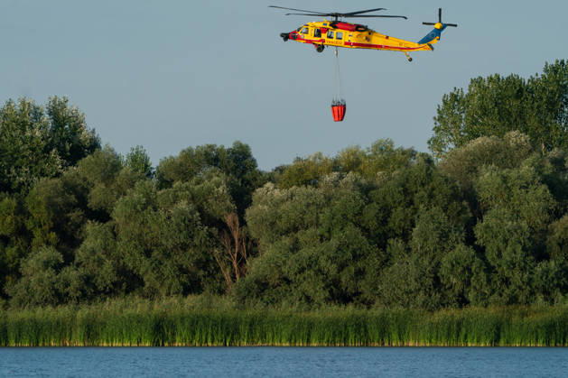 August 24, 2026, Kajtasovo, Vojvodina, Serbia: 2026823, Kajtasovo, Serbia -The European Union is actively assisting Serbia in battling severe wildfires at Serbia s request through the EU Civil Protection Mechanism, deploying four firefighting helicopters from Romania, Slovakia, the Czech Republic, and Germany, alongside ground response teams to contain large blazes like the one in the Deliblato Sands. A Romanian rescEU Black Hawk helicopter. Kajtasovo Serbia - ZUMAd223 20260824_zip_d223_003 Copyright: xMarkoxDimicx