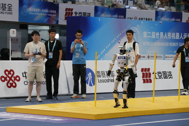 World Humanoid Robot Games in Beijing BEIJING, CHINA - AUGUST 24: Humanoid robots compete in 400-meter hurdles race within the second edition of World Humanoid Robot Games in Beijing, China on August 24, 2026. Emre Aytekin Anadolu Beijing China. Editorial use only. Please get in touch for any other usage.  Copyright: x2026xAnadoluxEmrexAytekinx