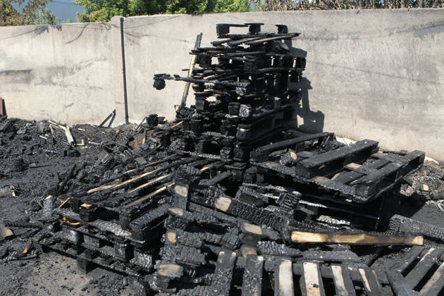 Burnt wooden pallets that caught fire as a result of a nighttime Russian UAV attack are in a parking lot near a shopping and entertainment centre in Dnipro, Ukraine, August 25, 2026. Fires broke out inside and near the shopping mall as a result of the Russian attack. (Photo by Mykola Miakshykov Ukrinform) Russian attack hits parking lot near shopping mall in Dnipro suburb  Copyright: xMykolaxMiakshykovx