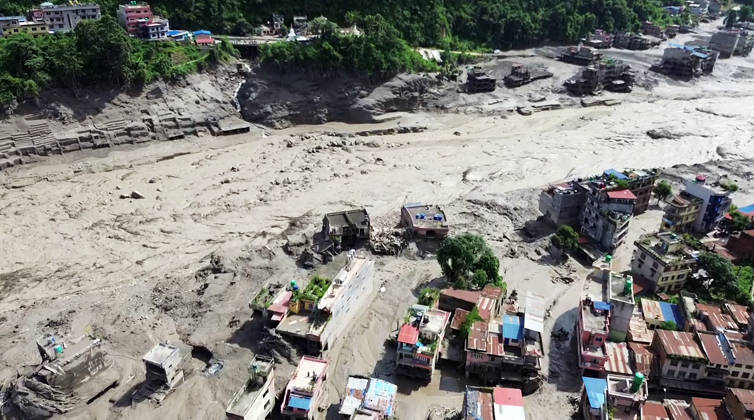 RECORD DATE NOT STATED Flash flood ravages Nepal™s Rasuwa Rasuwa Nepal , Aug 26 (ANI): An aerial view of the houses partially submerged in mud-laden flash flood following an outburst in the Bhotekoshi River, in Rasuwa on Wednesday. (ANI Video Grab) Rasuwa Nepal Copyright: xANIx ANI_20260826162