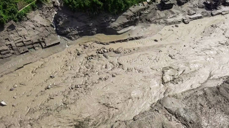RECORD DATE NOT STATED Flash flood ravages Nepal™s Rasuwa Rasuwa Nepal , Aug 26 (ANI): An aerial view of a mud-laden flash flood following an outburst in the Bhotekoshi River, in Rasuwa akot on Wednesday. (ANI Video Grab) Rasuwa Nepal Copyright: xANIx ANI_20260826173