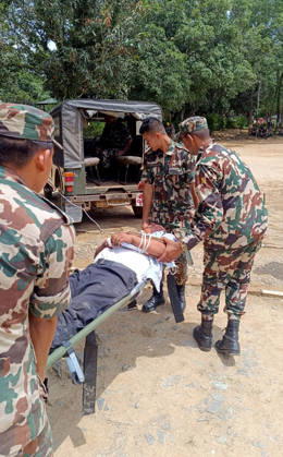 (260826) -- KATHMANDU, Aug. 26, 2026 -- Soldiers carry out rescue operations after flash floods in Rasuwa district, Nepal, Aug. 26, 2026. As many as 72 people have been found dead in the flash flood in the Bhote Koshi River in Nepal, police said. Abi Narayan Kafle, spokesperson of Nepal Police, confirmed to Xinhua, adding that 41 injured people have been receiving treatment in different hospitals. (RSS via Xinhua) (SpotNews) NEPAL-FLASH FLOODS-AFTERMATH ZhangxPing 