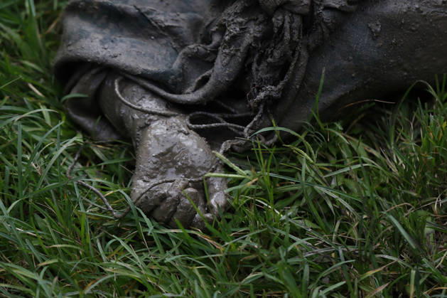 August 26, 2026, Nuwakot, Nepal: The body of a woman is pictured on the ground after recovery efforts from buildings and infrastructure that were damaged along the swollen Trishuli River following a massive flash flood triggered by an avalanche of ice and rock in the upper Lhende River on the Tibetan side, in Nuwakot district, Nepal, on Wednesday, August 26, 2026. The sudden flood swept through communities along the Bhote Koshi and Trishuli river systems, destroying homes, roads and bridges and leaving widespread devastation downstream. Nuwakot Nepal  - ZUMAg200 20260826_zap_g200_003 Copyright: xSkandaxGautamx