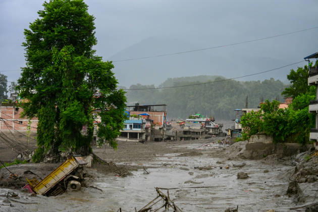 August 26, 2026, Kathmandu, Bagmati, Nepal: NUWAKOT, NEPAL - AUGUST 26: An aftermath view of flash floods and mudslides along the Trishuli River in Nuwakot, Nepal, on August 26, 2026. A catastrophic flash flood swept through Nepalâ€⠢s northern border region after an ice-and-rock avalanche, reportedly triggered by an earthquake, caused a sudden surge in the Lhende River on the Nepal-China border and sent massive volumes of water, mud and debris downstream into the Bhote Koshi and Trishuli river systems. The disaster devastated settlements in Rasuwa and Nuwakot districts, sweeping away homes, roads, bridges, vehicles and other infrastructure and severely damaging hydropower and power facilities. In Nuwakot, riverside settlements includin - ZUMAs330 20260826_zsp_s330_019 Copyright: xSafalxPrakashxShresthax