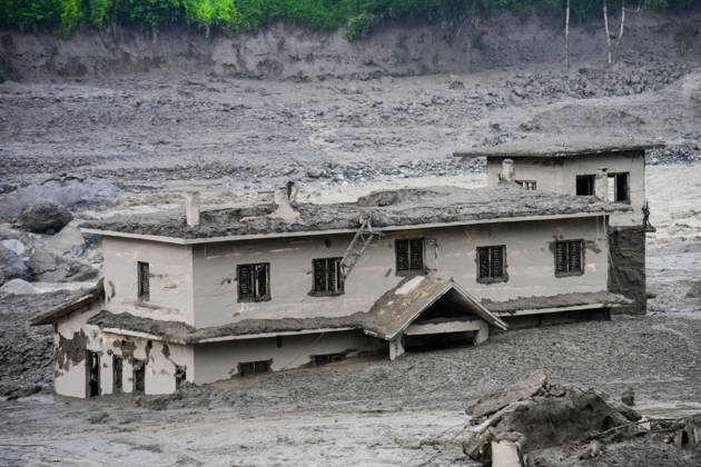August 26, 2026, Kathmandu, Bagmati, Nepal: NUWAKOT, NEPAL - AUGUST 26: An aftermath view of flash floods and mudslides along the Trishuli River in Nuwakot, Nepal, on August 26, 2026. A catastrophic flash flood swept through Nepalâ€⠢s northern border region after an ice-and-rock avalanche, reportedly triggered by an earthquake, caused a sudden surge in the Lhende River on the Nepal-China border and sent massive volumes of water, mud and debris downstream into the Bhote Koshi and Trishuli river systems. The disaster devastated settlements in Rasuwa and Nuwakot districts, sweeping away homes, roads, bridges, vehicles and other infrastructure and severely damaging hydropower and power facilities. In Nuwakot, riverside settlements includin - ZUMAs330 20260826_zsp_s330_040 Copyright: xSafalxPrakashxShresthax