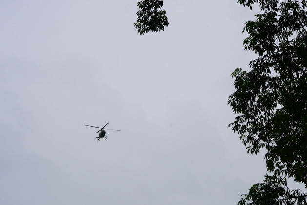 August 26, 2026, Kathmandu, Bagmati, Nepal: NUWAKOT, NEPAL - AUGUST 26: A helicopter conducts rescue operations over areas affected by flash floods and mudslides along the Trishuli River in Nuwakot, Nepal, on August 26, 2026. A catastrophic flash flood swept through Nepalâ€⠢s northern border region after an ice-and-rock avalanche caused a sudden surge in the Lhende River near the Nepal-China border, sending massive volumes of water, mud and debris downstream into the Bhote Koshi and Trishuli river systems. The disaster devastated settlements in Rasuwa and Nuwakot districts, sweeping away homes, roads, bridges, vehicles and other infrastructure and severely damaging hydropower and power facilities. In Nuwakot, riverside settlements incl - ZUMAs330 20260826_zsp_s330_046 Copyright: xSafalxPrakashxShresthax