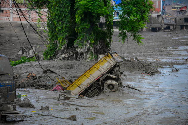 August 26, 2026, Kathmandu, Bagmati, Nepal: NUWAKOT, NEPAL - AUGUST 26: An aftermath view of flash floods and mudslides along the Trishuli River in Nuwakot, Nepal, on August 26, 2026. A catastrophic flash flood swept through Nepalâ€⠢s northern border region after an ice-and-rock avalanche, reportedly triggered by an earthquake, caused a sudden surge in the Lhende River on the Nepal-China border and sent massive volumes of water, mud and debris downstream into the Bhote Koshi and Trishuli river systems. The disaster devastated settlements in Rasuwa and Nuwakot districts, sweeping away homes, roads, bridges, vehicles and other infrastructure and severely damaging hydropower and power facilities. In Nuwakot, riverside settlements includin - ZUMAs330 20260826_zsp_s330_052 Copyright: xSafalxPrakashxShresthax