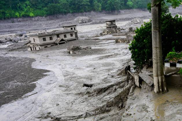 August 26, 2026, Nuwakot, Bagmati, Nepal: NUWAKOT, NEPAL - AUGUST 26, 2026: An aftermath view of flash floods and mudslides along the Trishuli River. A catastrophic flash flood swept through Nepalâ€⠢s northern border region after an ice-and-rock avalanche, reportedly triggered by an earthquake, caused a sudden surge in the Lhende River on the Nepal-China border and sent massive volumes of water, mud and debris downstream into the Bhote Koshi and Trishuli river systems. The disaster devastated settlements in Rasuwa and Nuwakot districts, sweeping away homes, roads, bridges, vehicles and other infrastructure and severely damaging hydropower and power facilities. In Nuwakot, riverside settlements including Trishuli Bazaar, Devighat, Betr - ZUMAq101 20260826_zna_q101_049 Copyright: xSafalxPrakashxShresthax