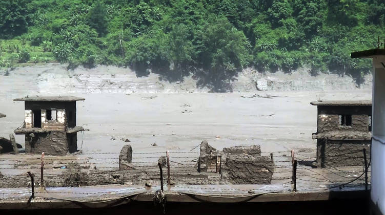 RECORD DATE NOT STATED Flash flood ravages Nepal™s Rasuwa Rasuwa Nepal , Aug 26 (ANI): An area devastated by mud-laden floodwaters following a flash flood caused by an outburst in the Bhotekoshi River, in Rasuwa on Wednesday. Around 105 Indians among the foreign nationals reported missing after the flash flood. (RSS Nepal ANI Video Grab) Rasuwa Nepal Copyright: xANIx ANI_20260826324