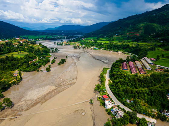 Aerial View Shows Extensive Damage After Flash Flood Sweeps Through The Bhotekoshi River In Nuwakot Aerial view shows flood-damaged areas after a flash flood swept through the Bhotekoshi River in Nuwakot, Nepal, on August 26, 2026. The flooding caused widespread damage to homes, roads, bridges and other infrastructure in the area, while many people remain missing; the figures are still developing Nuwakot bagmati Nepal  Copyright: xAmbirxTolangx originalFilename: tolang-aerialvi260826_np9go.jpg