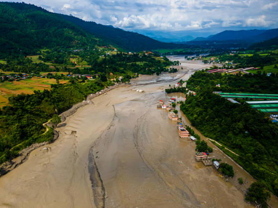 Aerial View Shows Extensive Damage After Flash Flood Sweeps Through The Bhotekoshi River In Nuwakot Aerial view shows flood-damaged areas after a flash flood swept through the Bhotekoshi River in Nuwakot, Nepal, on August 26, 2026. The flooding caused widespread damage to homes, roads, bridges and other infrastructure in the area, while many people remain missing; the figures are still developing Nuwakot bagmati Nepal  Copyright: xAmbirxTolangx originalFilename: tolang-aerialvi260826_npmZv.jpg