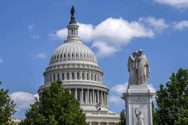 The Peace Monument is seen as the American flag is lowered to half staff over the U.S. Capitol to honor the late country music singer and philanthropist Dolly Parton in Washington, DC on Wednesday, August 26, 2026. Parton died yesterday at the age of 80 after a brief battle with cancer.  WAP20260826337 BONNIExCASH