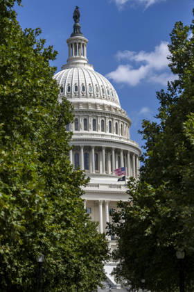 The American flag is lowered to half staff over the U.S. Capitol to honor the late country music singer and philanthropist Dolly Parton in Washington, DC on Wednesday, August 26, 2026. Parton died yesterday at the age of 80 after a brief battle with cancer.  WAP20260826338 BONNIExCASH