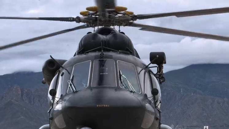 (260827) -- LHASA, Aug. 27, 2026 -- This screenshot from a video clip taken on Aug. 27, 2026 shows a military helicopter heading to Gyirong County, southwest China s Xizang Autonomous Region. The first team of 141 rescuers has arrived at the mudslide-stricken border port of Gyirong in Xizang Thursday morning after the disaster caused significant casualties along the China-Nepal border, according to China s Ministry of Emergency Management. The mudslide struck Gyirong Port in Gyirong County, Xizang, on Wednesday morning. As of 8 a.m. on Thursday, three people had been killed, 558 others remained missing, while two local villagers had been rescued, local authorities said. (Photo by Xinhua) (SpotNews) CHINA-XIZANG-MUDSLIDE-RESCUE FORCES