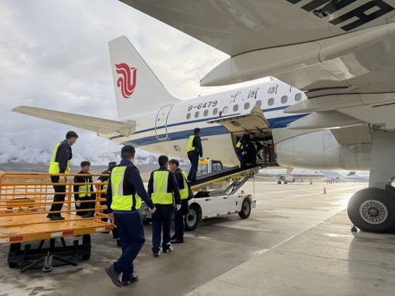 (260827) -- BEIJING, Aug. 27, 2026 -- A plane carrying a rescue team and supplies arrives at an airport in Xigaze in southwest China s Xizang Autonomous Region, Aug. 27, 2026. The first team of 141 rescuers has arrived at the mudslide-stricken border port of Gyirong in Xizang Thursday morning after the disaster caused significant casualties along the China-Nepal border, according to China s Ministry of Emergency Management. The mudslide struck Gyirong Port in Gyirong County, Xizang, on Wednesday morning. As of 8 a.m. on Thursday, three people had been killed, 558 others remained missing, while two local villagers had been rescued, local authorities said. (Photo by Xinhua) (SpotNews) CHINA-XIZANG-MUDSLIDE-RESCUE FORCES (CN) ZhangxRuiyu