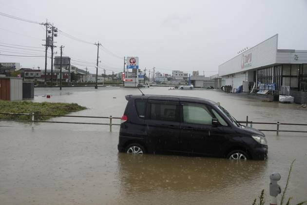 Aftermath of torrential rain in central Japan Photo shows an abandoned vehicle in floodwater in Himi, Toyama Prefecture, on Aug. 27, 2026, following torrential rain.  A14AA0005626664P