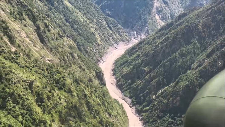 (260827) -- GYIRONG, Aug. 27, 2026 -- This screenshot from a video clip taken on Aug. 27, 2026 shows a military helicopter hovering over the mudslide-hit Gyirong Port in Gyirong County, southwest China s Xizang Autonomous Region. The mudslide struck Gyirong Port in Gyirong County, Xizang, on Wednesday morning. As of 8 a.m. on Thursday, three people had been killed, 558 others remained missing, while two local villagers had been rescued, local authorities said. (Photo by Xinhua) (SpotNews) CHINA-XIZANG-GYIRONG PORT-HELICOPTERS-ARRIVAL (CN) ZhouxFeng
