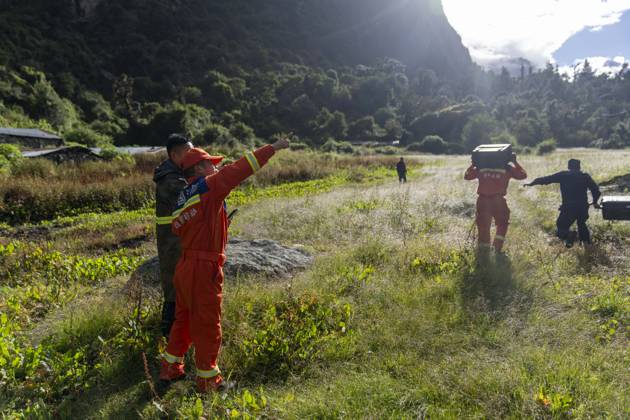 (260827) -- XIGAZE, Aug. 27, 2026 -- Rescuers prepare to fly a drone to inspect the mudslide-hit areas, in Xigaze, southwest China s Xizang Autonomous Region, Aug. 27, 2026. A mudslide, which occurred on the Nepalese side, struck Gyirong Port in Gyirong County of Xigaze City, Xizang, on Wednesday morning, leaving three people dead and 558 others, including 260 foreign nationals, missing, according to preliminary estimates. ) (SpotNews) CHINA-XIZANG-XIGAZE-MUDSLIDE-RESCUE (CN) TenzingxNimaxQadhup