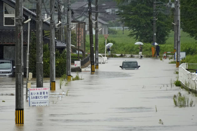 Torrential rain in central Japan Photo taken on Aug. 27, 2026, shows a submerged vehicle in Himi in Toyama Prefecture, central Japan, following torrential rain.  A14AA0005626687P