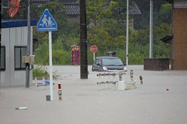 Torrential rain in central Japan Photo taken on Aug. 27, 2026, shows a submerged vehicle in Himi in Toyama Prefecture, central Japan, following torrential rain.  A14AA0005626688P
