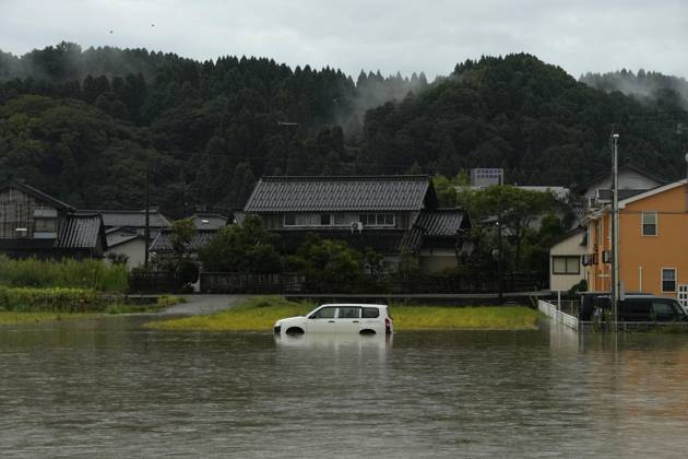 Torrential rain in central Japan Photo taken on Aug. 27, 2026, shows a submerged vehicle in Himi in Toyama Prefecture, central Japan, following torrential rain.  A14AA0005626689P