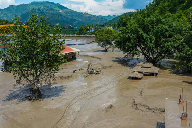 Bhotekoshi Floods Damage Homes and Infrastructure in Nuwakot Nepal Kathmandu, Nepal - August 26, 2026: Flooding in the Bhotekoshi River has affected low-lying areas along the riverbanks and nearby residences in Nuwakot, Nepal. The flooding caused widespread damage to homes, roads, bridges, and other infrastructure in the area, while several people remain missing and the number of casualties is still being assessed. (Photo by AP Tolang Nexpher Images) Nuwakot bagmati