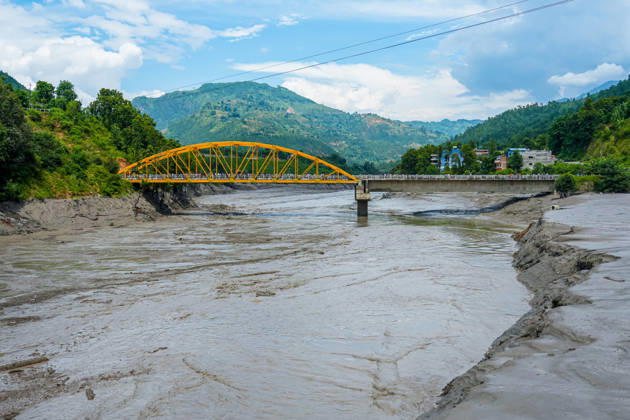 Bhotekoshi Floods Damage Homes and Infrastructure in Nuwakot Nepal Kathmandu, Nepal - August 26, 2026: Flooding in the Bhotekoshi River has affected low-lying areas along the riverbanks and nearby residences in Nuwakot, Nepal. The flooding caused widespread damage to homes, roads, bridges, and other infrastructure in the area, while several people remain missing and the number of casualties is still being assessed. (Photo by AP Tolang Nexpher Images) Nuwakot bagmati