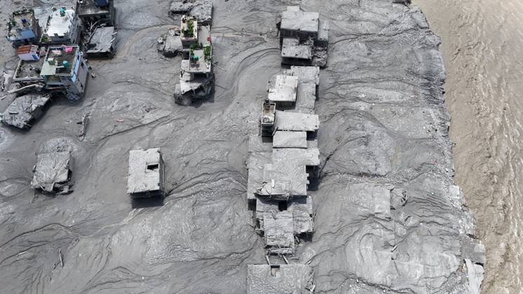 August 27, 2026, Nuwakot, Nepal: An aerial view shows buildings buried in mud and debris following flash floods at Devighat in Bidur Municipality, Nuwakot district, Nepal, on Thursday, August 27, 2026. The floods, triggered by a glacial collapse and debris flow upstream, have killed at least 270 people and left 826 others out of contact, according to Nepalese authorities, with search and rescue operations continuing. Nuwakot Nepal - ZUMAg200 20260827_zap_g200_001 Copyright: xSkandaxGautamx
