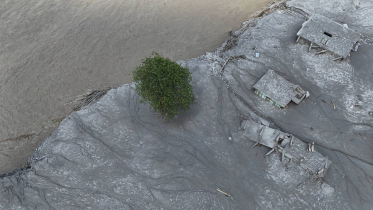 August 27, 2026, Nuwakot, Nepal: An aerial view shows buildings buried in mud and debris following flash floods at Devighat in Bidur Municipality, Nuwakot district, Nepal, on Thursday, August 27, 2026. The floods, triggered by a glacial collapse and debris flow upstream, have killed at least 270 people and left 826 others out of contact, according to Nepalese authorities, with search and rescue operations continuing. Nuwakot Nepal - ZUMAg200 20260827_zap_g200_003 Copyright: xSkandaxGautamx