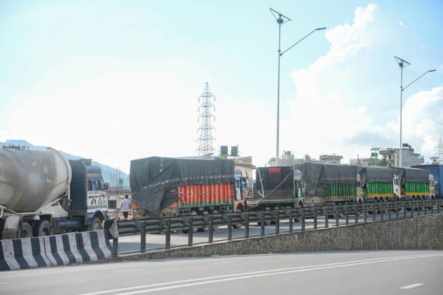 August 27, 2026, Kathmandu, Bagmati, Nepal: Trucks and other vehicles remain stranded along the Kalankiâ€Thankotâ€Nagdhunga route in Kathmandu, Nepal, on August 27, 2026, as major highways remain closed following devastating flash floods and landslides. The stranded vehicles have occupied multiple lanes along the road, causing traffic congestion and further disrupting movement in the area. The floods swept through Rasuwa and other parts of central Nepal before surging downstream along the Trishuli and Narayani river systems, damaging roads, bridges, settlements and other infrastructure. The Nagdhungaâ€Muglin route, a key road connection between Kathmandu and other parts of the country, has been closed, disrupting the movem - ZUMAs330 20260827_zsp_s330_007 Copyright: xSafalxPrakashxShresthax