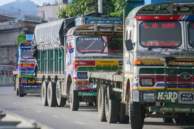 August 27, 2026, Kathmandu, Bagmati, Nepal: Trucks and other vehicles remain stranded along the Kalankiâ€Thankotâ€Nagdhunga route in Kathmandu, Nepal, on August 27, 2026, as major highways remain closed following devastating flash floods and landslides. The stranded vehicles have occupied multiple lanes along the road, causing traffic congestion and further disrupting movement in the area. The floods swept through Rasuwa and other parts of central Nepal before surging downstream along the Trishuli and Narayani river systems, damaging roads, bridges, settlements and other infrastructure. The Nagdhungaâ€Muglin route, a key road connection between Kathmandu and other parts of the country, has been closed, disrupting the movem - ZUMAs330 20260827_zsp_s330_008 Copyright: xSafalxPrakashxShresthax