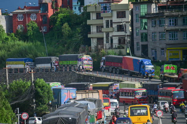 August 27, 2026, Kathmandu, Bagmati, Nepal: Trucks and other vehicles remain stranded along the Kalankiâ€Thankotâ€Nagdhunga route in Kathmandu, Nepal, on August 27, 2026, as major highways remain closed following devastating flash floods and landslides. The stranded vehicles have occupied multiple lanes along the road, causing traffic congestion and further disrupting movement in the area. The floods swept through Rasuwa and other parts of central Nepal before surging downstream along the Trishuli and Narayani river systems, damaging roads, bridges, settlements and other infrastructure. The Nagdhungaâ€Muglin route, a key road connection between Kathmandu and other parts of the country, has been closed, disrupting the movem - ZUMAs330 20260827_zsp_s330_011 Copyright: xSafalxPrakashxShresthax