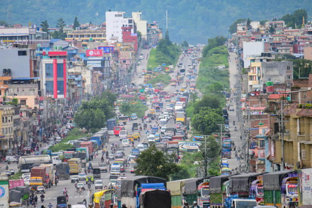 August 27, 2026, Kathmandu, Bagmati, Nepal: Trucks and other vehicles remain stranded along the Kalankiâ€Thankotâ€Nagdhunga route in Kathmandu, Nepal, on August 27, 2026, as major highways remain closed following devastating flash floods and landslides. The stranded vehicles have occupied multiple lanes along the road, causing traffic congestion and further disrupting movement in the area. The floods swept through Rasuwa and other parts of central Nepal before surging downstream along the Trishuli and Narayani river systems, damaging roads, bridges, settlements and other infrastructure. The Nagdhungaâ€Muglin route, a key road connection between Kathmandu and other parts of the country, has been closed, disrupting the movem - ZUMAs330 20260827_zsp_s330_038 Copyright: xSafalxPrakashxShresthax