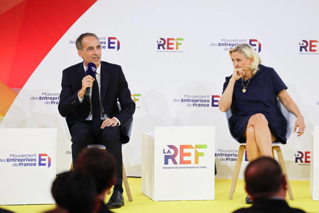 REF Medef - Presidential Debate French centre-left party Place publique s leader Raphael Glucksmann and President of the Rassemblement National party Marine Le Pen at the presidential debate during the La REF 2026 meeting of French entrepreneurs, organised by the MEDEF, France s main employers federation, at the Roland-Garros venue in Paris, France on August 27, 2026. Photo by Raphael Lafargue ABACAPRESS.COM Paris France  Copyright: xLafarguexRaphael ABACAx