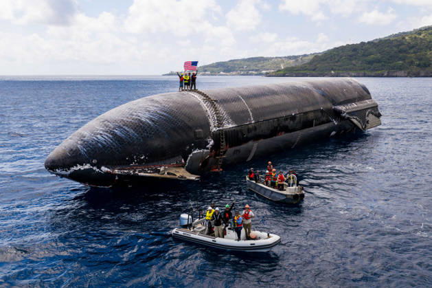 SpaceX engineers spent several days inspecting Ship 40 in the waters off Christmas Island as seen in pictures released on Thursday, August 27, 2026. They collected heatshield samples and gained vital insight into how the vehicle handled reentry, with improvements now planned for future vehicles. Starship has now been loaded onto a semi-submersible ship to begin the several-month journey back to Starbase.  WAX2026082704 SPACEX