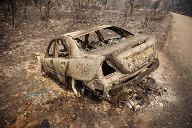 Wildfires in Algeria claim at least 12 lives across several provinces JIJEL, ALGERIA - AUGUST 27: A view of a damaged vehicle as forest fires in eastern Algerian provinces turn green vegetation to ashes and cause material damage to homes and vehicles in the Beni Aicha village of Boraoui Belhadef Municipality in Jijel, Algeria on August 27, 2026. At least 12 people have died in wildfires that have swept through several provinces in Algeria, Interior Minister Said Sayoud said Wednesday, according to local media. The 159 fire outbreaks reported across the country have claimed five lives in Jijel, four in Bejaia and three in Tizi Ouzou. Hamza Zait Anadolu Jijel Algeria. Editorial use only. Please get in touch for any other usage.  Copyright: x2026xAnadoluxHamzaxZaitx