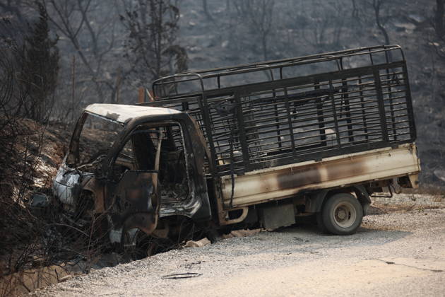 Wildfires in Algeria claim at least 12 lives across several provinces JIJEL, ALGERIA - AUGUST 27: A view of a damaged vehicle as forest fires in eastern Algerian provinces turn green vegetation to ashes and cause material damage to homes and vehicles in the Beni Aicha village of Boraoui Belhadef Municipality in Jijel, Algeria on August 27, 2026. At least 12 people have died in wildfires that have swept through several provinces in Algeria, Interior Minister Said Sayoud said Wednesday, according to local media. The 159 fire outbreaks reported across the country have claimed five lives in Jijel, four in Bejaia and three in Tizi Ouzou. Hamza Zait Anadolu Jijel Algeria. Editorial use only. Please get in touch for any other usage.  Copyright: x2026xAnadoluxHamzaxZaitx