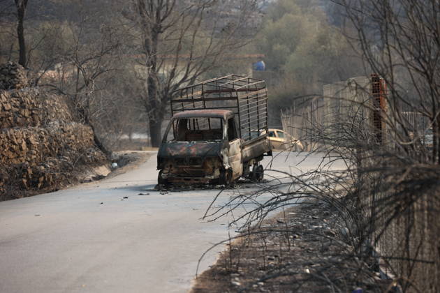 Wildfires in Algeria claim at least 12 lives across several provinces JIJEL, ALGERIA - AUGUST 27: A view of a damaged vehicle as forest fires in eastern Algerian provinces turn green vegetation to ashes and cause material damage to homes and vehicles in the Beni Aicha village of Boraoui Belhadef Municipality in Jijel, Algeria on August 27, 2026. At least 12 people have died in wildfires that have swept through several provinces in Algeria, Interior Minister Said Sayoud said Wednesday, according to local media. The 159 fire outbreaks reported across the country have claimed five lives in Jijel, four in Bejaia and three in Tizi Ouzou. Hamza Zait Anadolu Jijel Algeria. Editorial use only. Please get in touch for any other usage.  Copyright: x2026xAnadoluxHamzaxZaitx