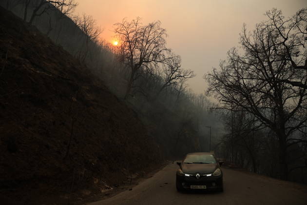 Wildfires in Algeria claim at least 12 lives across several provinces JIJEL, ALGERIA - AUGUST 27: Forest fires in eastern Algerian provinces turn green vegetation to ashes and cause material damage to homes and vehicles in the Beni Aicha village of Boraoui Belhadef Municipality in Jijel, Algeria on August 27, 2026. At least 12 people have died in wildfires that have swept through several provinces in Algeria, Interior Minister Said Sayoud said Wednesday, according to local media. The 159 fire outbreaks reported across the country have claimed five lives in Jijel, four in Bejaia and three in Tizi Ouzou. Hamza Zait Anadolu Jijel Algeria. Editorial use only. Please get in touch for any other usage.  Copyright: x2026xAnadoluxHamzaxZaitx