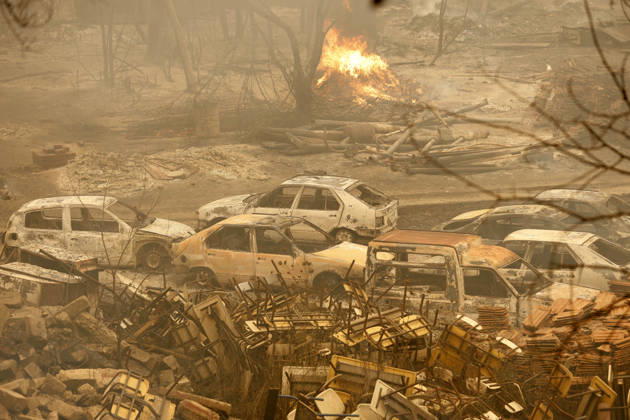 Fires in Jijel and Bedjaia: A general view of the burned houses, cars, and animals in the village of Nador, in the Jijel Mountains east of Algiers, in Algeria on August 27, 2026. The Algerian Ministry of the Interior announced that at least 12 people have died and 54 others have been injured in multiple forest fires across the country. Photo by Billel Bensalem, APP, Jijel, Algeria Copyright: xAlgÃ riexPressexPhotosxBillelxBensalemx xAPPx _MG_8956