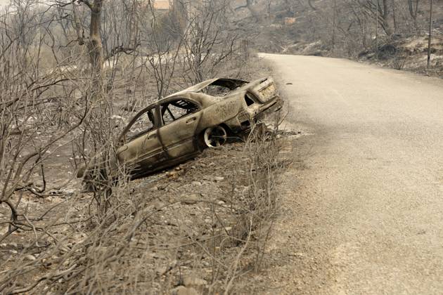 Fires in Jijel and Bedjaia: A general view of the burned houses, cars, and animals in the village of Nador, in the Jijel Mountains east of Algiers, in Algeria on August 27, 2026. The Algerian Ministry of the Interior announced that at least 12 people have died and 54 others have been injured in multiple forest fires across the country. Photo by Billel Bensalem, APP, Jijel, Algeria Copyright: xAlgÃ riexPressexPhotosxBillelxBensalemx xAPPx _MG_8963